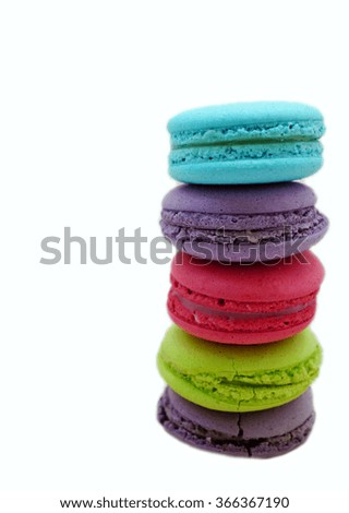 Colorful macarons isolated on white background. 