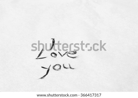Simple "I love you" handwritten message with black ink