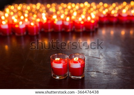 Couple candles in red  transparent chandeliers