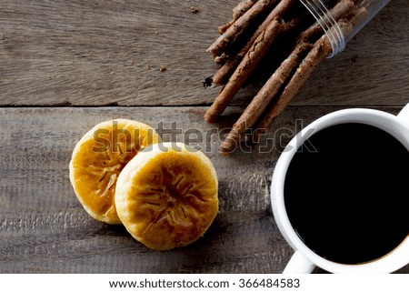 black coffee on wood background 