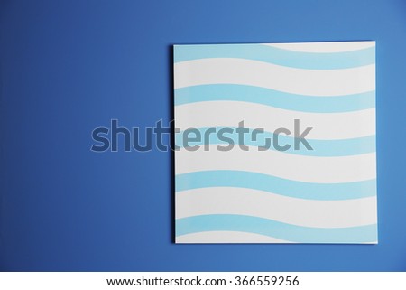 Abstract picture on a blue wall background