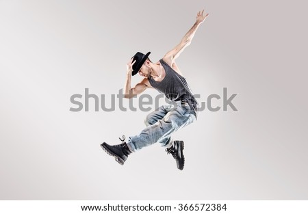 Young hip-hop dancer Royalty-Free Stock Photo #366572384