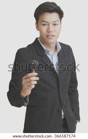 Young mYoung man with the keys car.Isolated on white background.an with the keys car isolate