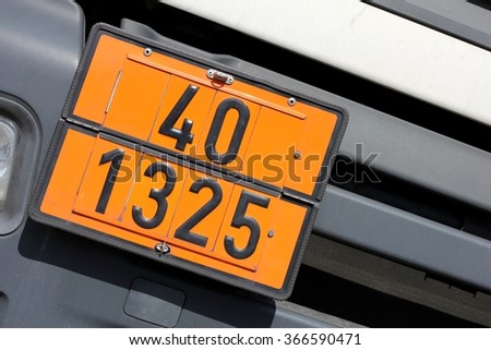 orange-colored plate with hazard-identification number 40 and UN-Number 1325 (flammable solids, organic, n.o.s.)