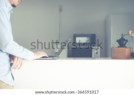 Counter kitchen,Men use the personal computer