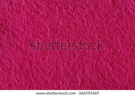 Background of pink felt.