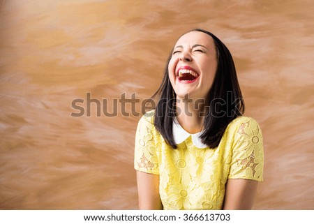 Portrait of woman laughing 