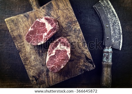 Dry aged Entrecote on Cutting Board Royalty-Free Stock Photo #366645872