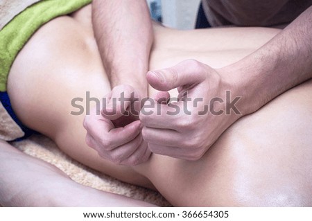 Close photo of the hands making massage