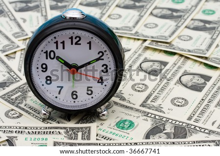 Clock sitting on one dollar bill background, Costs of medication