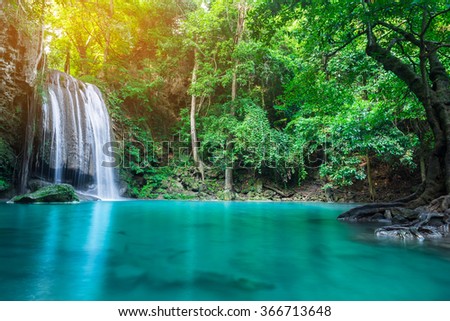 Waterfall in tropical forest at Erawan waterfall National Park, Thailand 