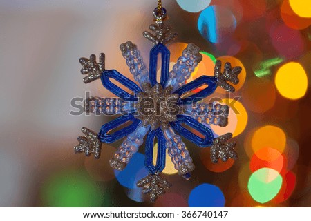 Christmas toy in the form of snowflakes