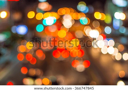 Bokeh from the lights of cars on the road at night