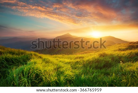 Mountain valley during sunrise. Natural summer landscape Royalty-Free Stock Photo #366765959