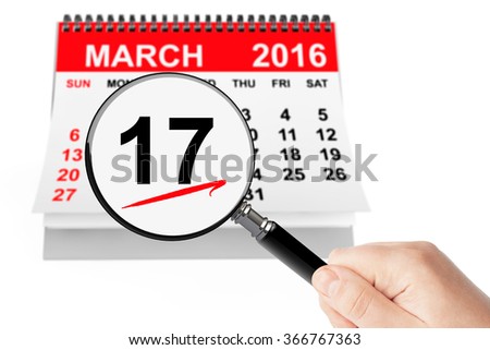St. Patrick Day Concept. 17 march 2016 calendar with magnifier on a white background
