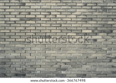 Grey brick wall texture background. Vintage effect.