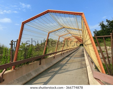 Colorful bridge with canopy with blue sky - landscape photo