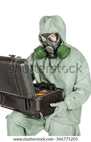 Man with protective mask and protective clothes prepares equipment for work. portrait isolated over white studio background.