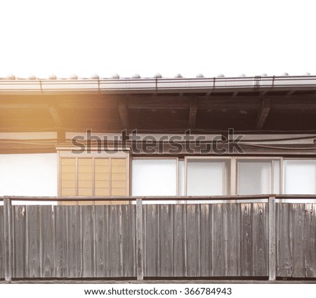  Old traditional Asian building with Sun lay