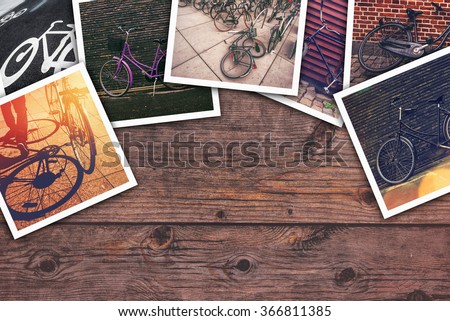 Bicycle pictures collage, stack of bike photos on wooden desk as copy space for cyclist lifestyle themed image.