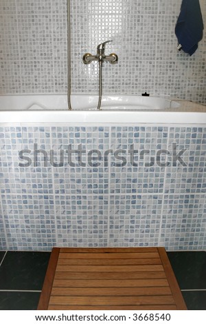 Bathroom with blue and white glazed tiles