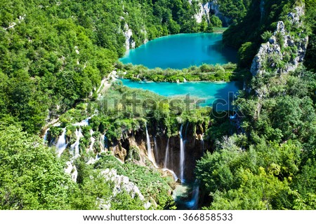 Top view of Plitvice Lakes with waterfalls and surrounding forest Royalty-Free Stock Photo #366858533