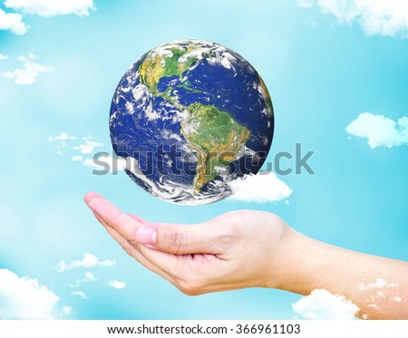 Open female hand with floating  world globe and cloud with light blue sky background, Environment concept, Elements of this image furnished by NASA