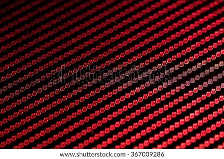 Kevlar abstract red background.