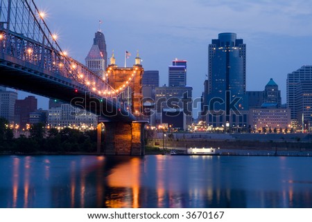 Cincinnati skyline and Roebling Suspension Bridge shortly before sunrise.