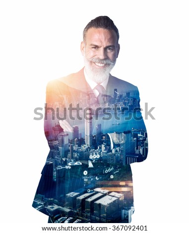 Portrait of bearded businessman smiling. Double exposure city on the background. 