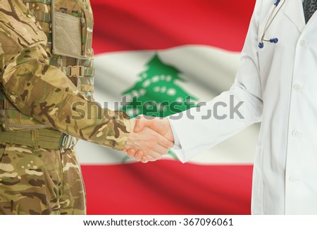 Soldier in uniform and doctor shaking hands with national flag on background - Lebanon