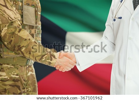 Soldier in uniform and doctor shaking hands with national flag on background - Kuwait