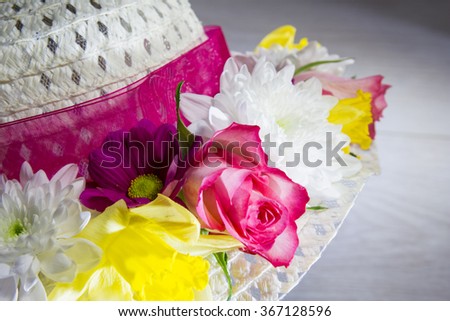Fresh Flowers on a Wedding Hat or Easter Bonnet? You decide.  Royalty-Free Stock Photo #367128596