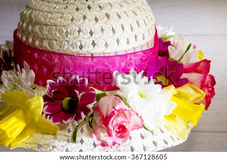 Fresh Flowers on a Wedding Hat or Easter Bonnet? You decide.  Royalty-Free Stock Photo #367128605