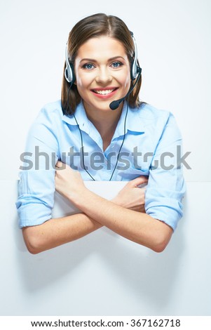 Woman operator with headset and blank sign board. Isolated portrait of smiling help line operator.