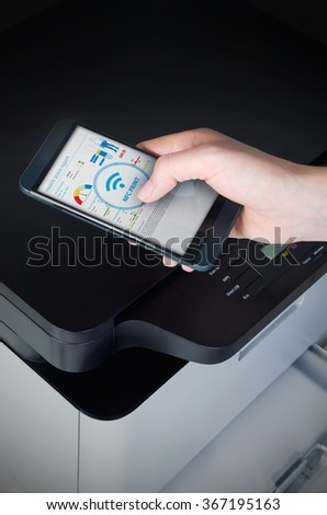 Wireless easy printing with Near Field Communication technology. NFC devices in office