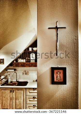 Feature domestic crucifixes.