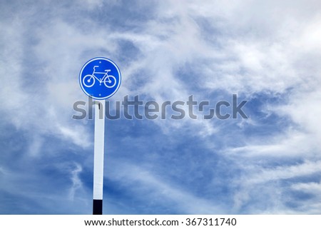 Bicycle lane sign on sky background