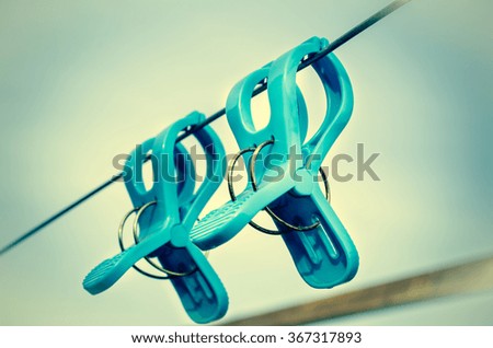 Color vintage effect Image for blue plastic clothespins, Fashion concept 