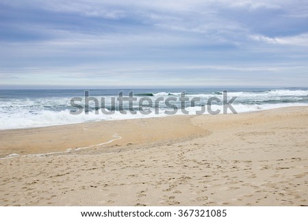 The Atlantic Ocean. Beach in winter Royalty-Free Stock Photo #367321085