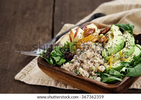 Quinoa, avocado and apple salad. Perfect for the detox diet or just a healthy meal. Selective focus with extreme shallow depth of field. 