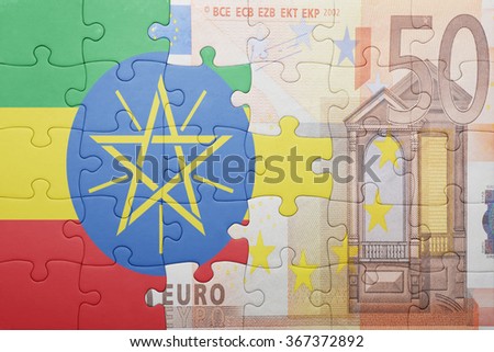 puzzle with the national flag of ethiopia and euro banknote . concept