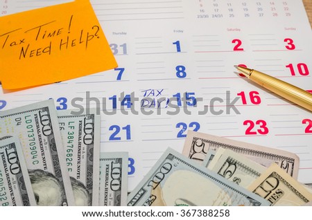 Tax Time! calendar with dollar and pen