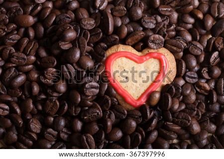 Coffee beans with cookie for background.