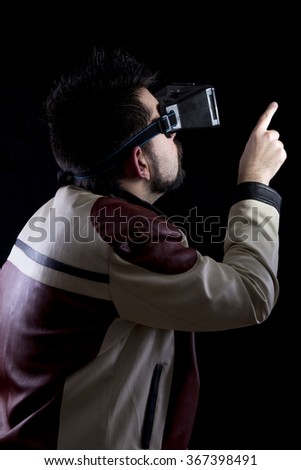 Close-up of man in vr glasses playing games and reaction