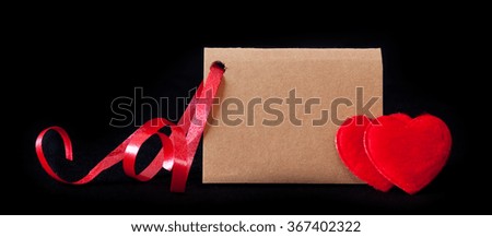 Valentine's day  card and red  hearts .