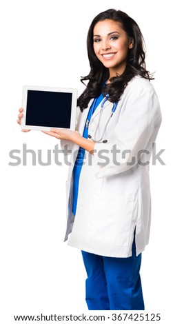 Young Hispanic doctor nurse in scrubs and lab coat displaying digital tablet isolated on white background