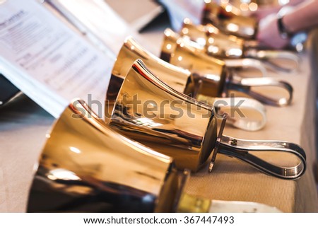 Handbells with sheet of music Royalty-Free Stock Photo #367447493