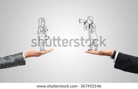 Caricatures of businessman and businesswoman