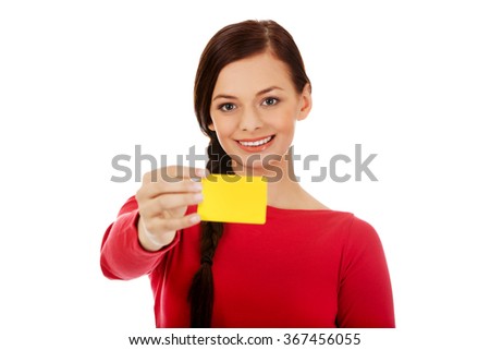 Young woman holding empty business card